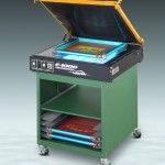 Model E-1000 Entry Level Tabletop Exposing Unit with 20-watt unfiltered black UV bulbs, holds 53 x 61 cm screen using vacuum hold down. Shown on optional Utility Cart.